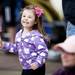 Tecumseh resident Adilyn Hanes stands next to her grandparents and gets excited as she spots horses on Monday, May 27. Daniel Brenner I AnnArbor.com